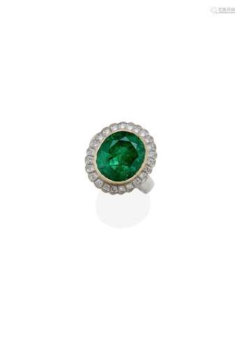 AN EMERALD AND DIAMOND RING