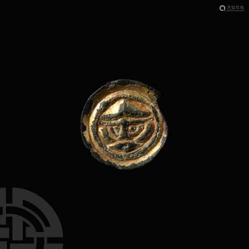 Large Anglo-Saxon Gilded Button Brooch with Helmetted Head