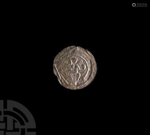 Medieval Silver Bracteate with Seated Figure