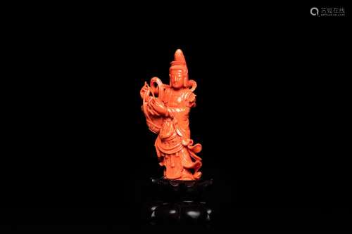 A Chinese carved red coral 'Tara' figure, 19/20th C.