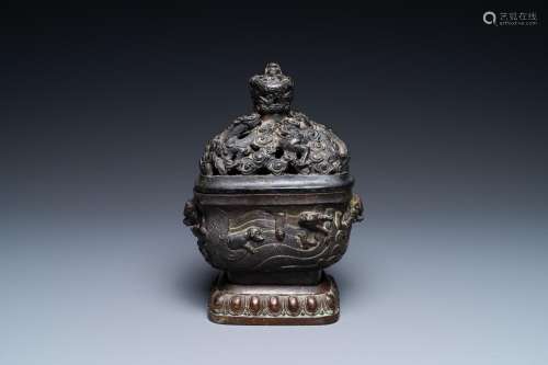 A Chinese bronze 'mythical beasts' censer and cover, 17th C.