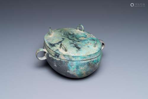 A Chinese archaic bronze 'zhou' bowl and cover, Spring and A...