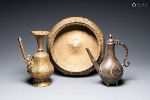 A Tibetan brass ewer, an alms bowl and an Indian bronze ewer...