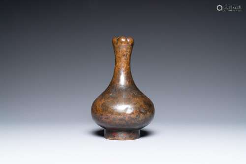 A Chinese bronze garlic-head 'hu' wine vessel, Eastern Zhou/...