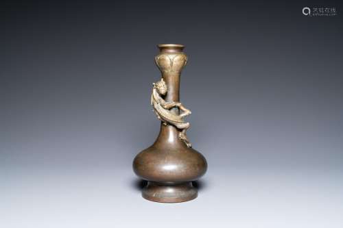 A Chinese bronze garlic-head 'hu' vase, Qianlong mark and of...