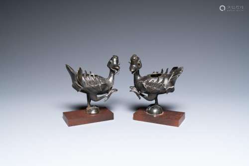 A pair of Chinese bronze 'mandarin ducks' censers, Ming