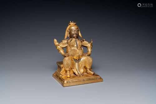 A Chinese gilt bronze figure of Guandi, Ming