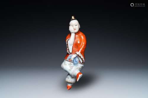 A Chinese polychrome porcelain 'reclining lady' snuff bottle...