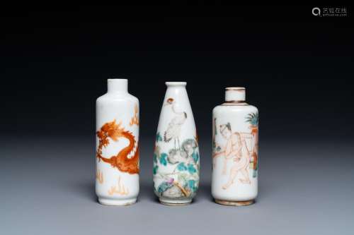 Three Chinese iron red and famille rose snuff bottles incl. ...