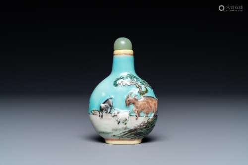 A Chinese relief-molded snuff bottle depicting goats, Yang H...