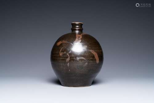A Chinese black-brown-glazed russet-splashed jar, Henan kiln...