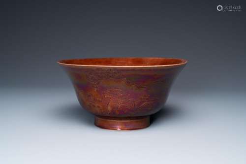 A Chinese aubergine-glazed bowl with incised design of crane...