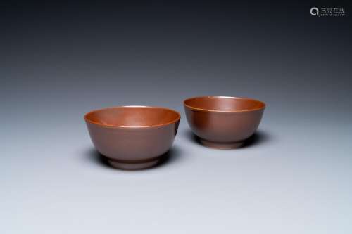 A pair of Chinese cafe au lait-glazed bowls, Qianlong mark a...