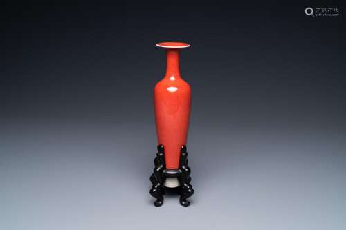 A Chinese slender 'peach bloom'-glazed vase, Kangxi mark but...