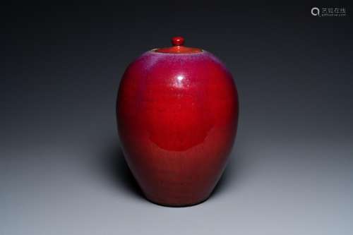 A Chinese monochrome sang de boeuf-glazed vase and cover, 19...