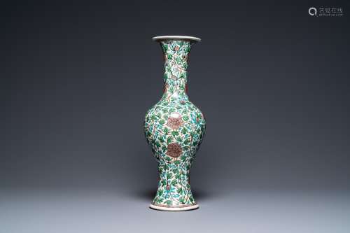 A Chinese verte biscuit 'peony scroll' vase, Ming