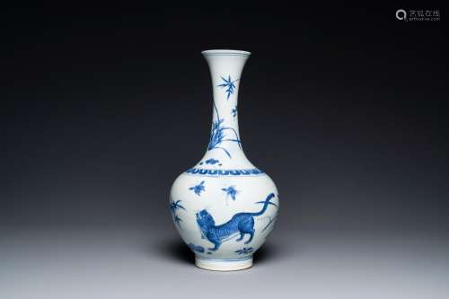 A rare Chinese blue and white bottle vase with a tiger and t...