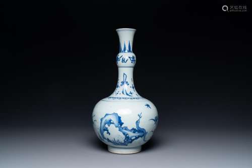 A Chinese blue and white bottle vase with a frog, a lizard a...
