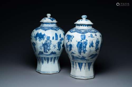 A pair of Chinese blue and white vases and covers with narra...