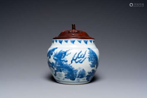 A Chinese blue and white 'qilin' bowl with later wooden cove...