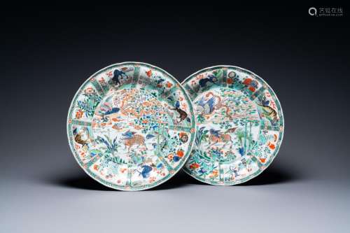 A pair of Chinese famille verte 'mythical animals' dishes, s...