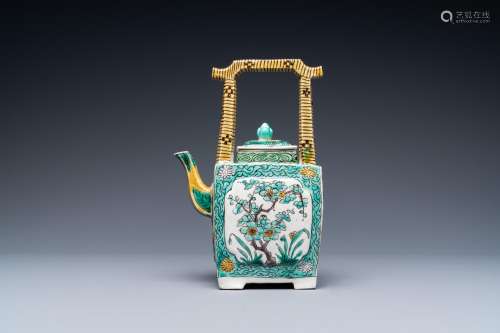 A Chinese verte biscuit teapot and cover, Kangxi