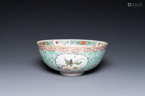 A Chinese famille verte relief-decorated bowl with squirrels...