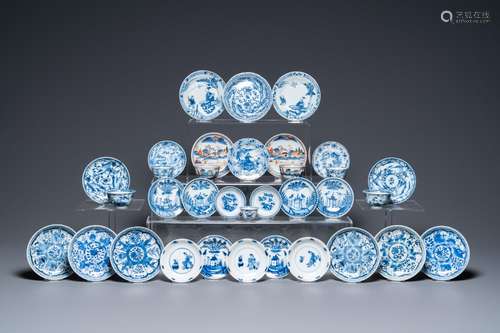 Twenty-seven Chinese blue and white saucers and seven cups, ...