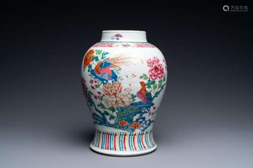 A Chinese famille rose vase with birds among blossoming bran...