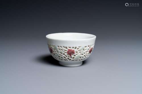 A Chinese reticulated double-walled cup with copper-red and ...