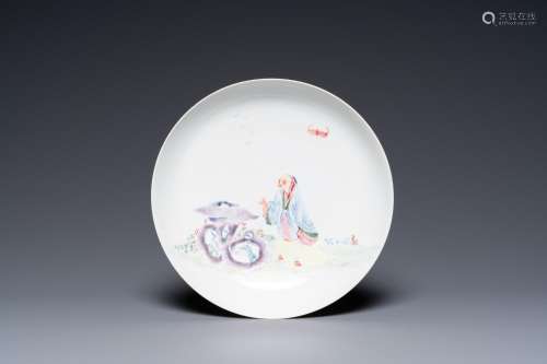 A fine Chinese famille rose eggshell porcelain plate with an...