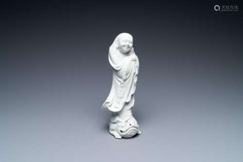 A Chinese Dehua blanc de Chine figure of Liu Hai with the to...