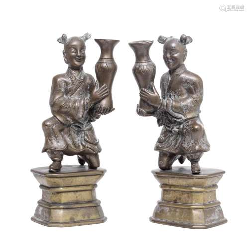 A PAIR OF COPPER ALLOY 'BOYS' JOSS STICK HOLDERS AND...