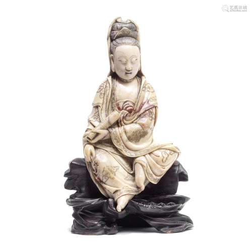 A SOAPSTONE CARVING OF A SEATED GUANYIN 18th century (2)