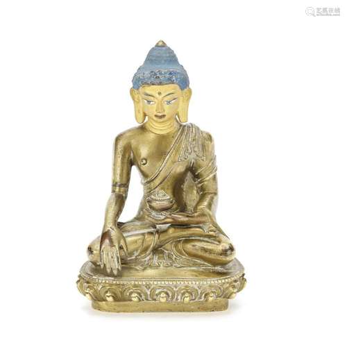 A GILT COPPER ALLOY FIGURE OF BUDDHA SHAKYAMUNI Tibet, 19th ...