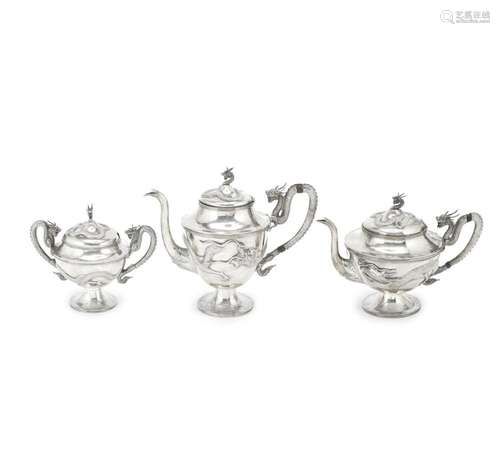 AN EXPORT THREE-PIECE SILVER TEA SERVICE Mark of MH, Canton,...