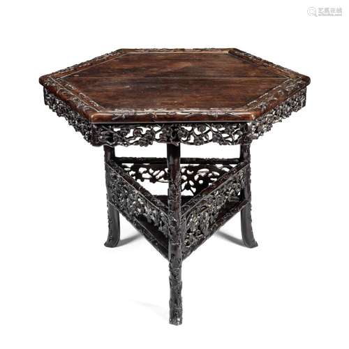 A CARVED HONGMU HEXAGONAL 'PRUNUS' TABLE 19th centur...