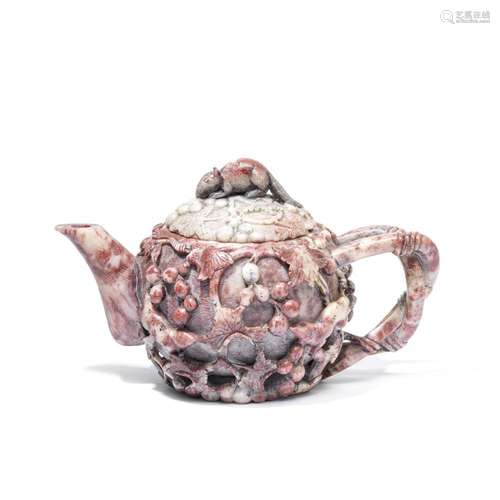 A SOAPSTONE TEAPOT AND COVER 18th/19th century (2)