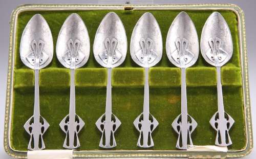 A SET OF SIX LIBERTY & CO TUDRIC PEWTER SPOONS