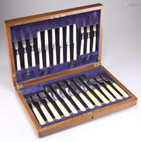 A SET OF SIX GEORGE V SILVER AND IVORY-HANDLED FISH KNIVES A...