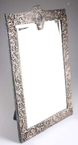 A VERY LARGE EDWARDIAN SILVER-MOUNTED MIRROR