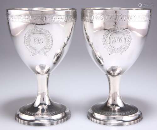 A LARGE PAIR OF GEORGE III IRISH SILVER GOBLETS
