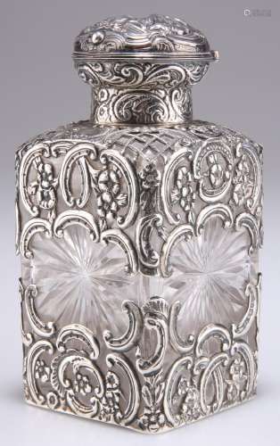 A LARGE VICTORIAN SILVER-MOUNTED CUT-GLASS SCENT BOTTLE