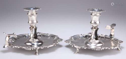 A PAIR OF GEORGE II SILVER CHAMBERSTICKS