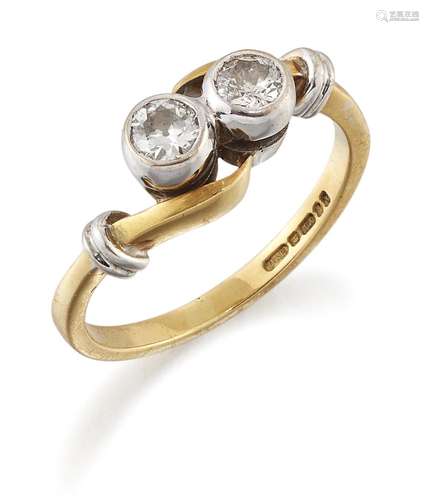 AN 18 CARAT GOLD DIAMOND TWO STONE RING