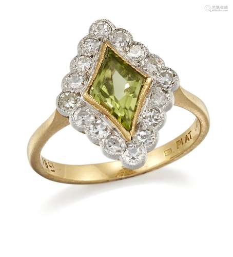 A PERIDOT AND DIAMOND CLUSTER RING