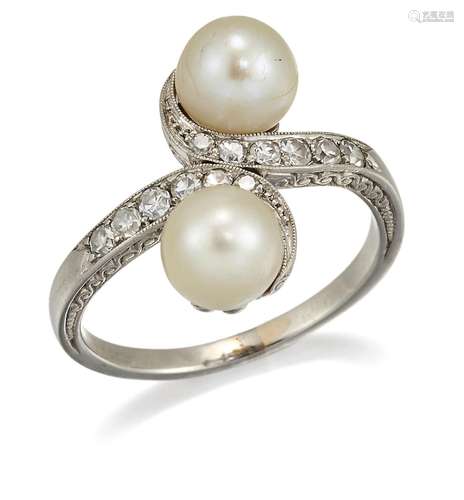 A NATURAL PEARL AND DIAMOND CROSSOVER RING