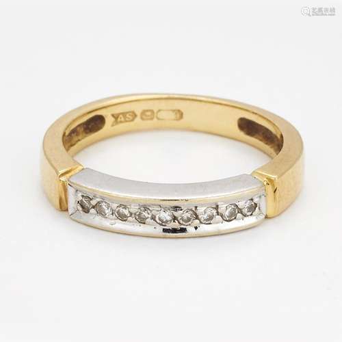 A DIAMOND HALF HOOP RING