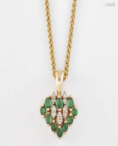 AN EMERALD AND DIAMOND CLUSTER PENDANT ON CHAIN