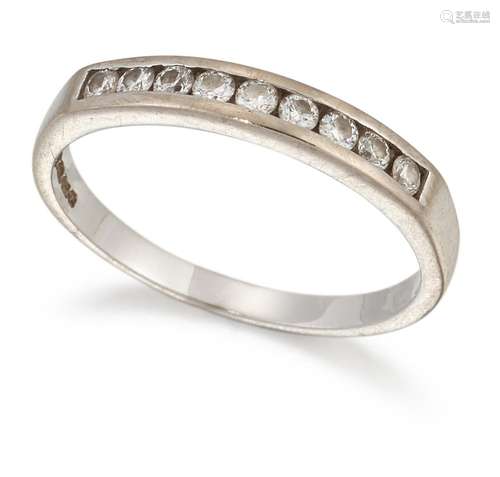 AN 18 CARAT WHITE GOLD DIAMOND HALF HOOP RING